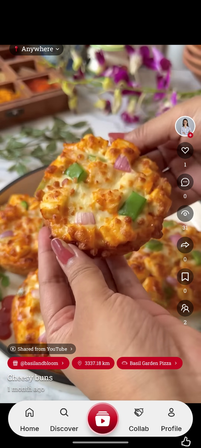 TasteReel food reel showing the creator, distance, restaurant tag and local discovery controls.